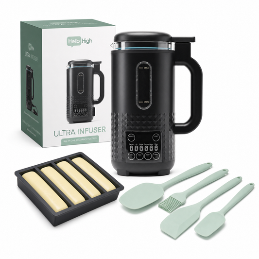 A Ultra Infuser is the best overall herbal infuser set shown on a white background, including the black electric infuser machine, its green-and-white retail box, a black silicone mold with pale yellow dough sticks, and four mint green silicone utensils.